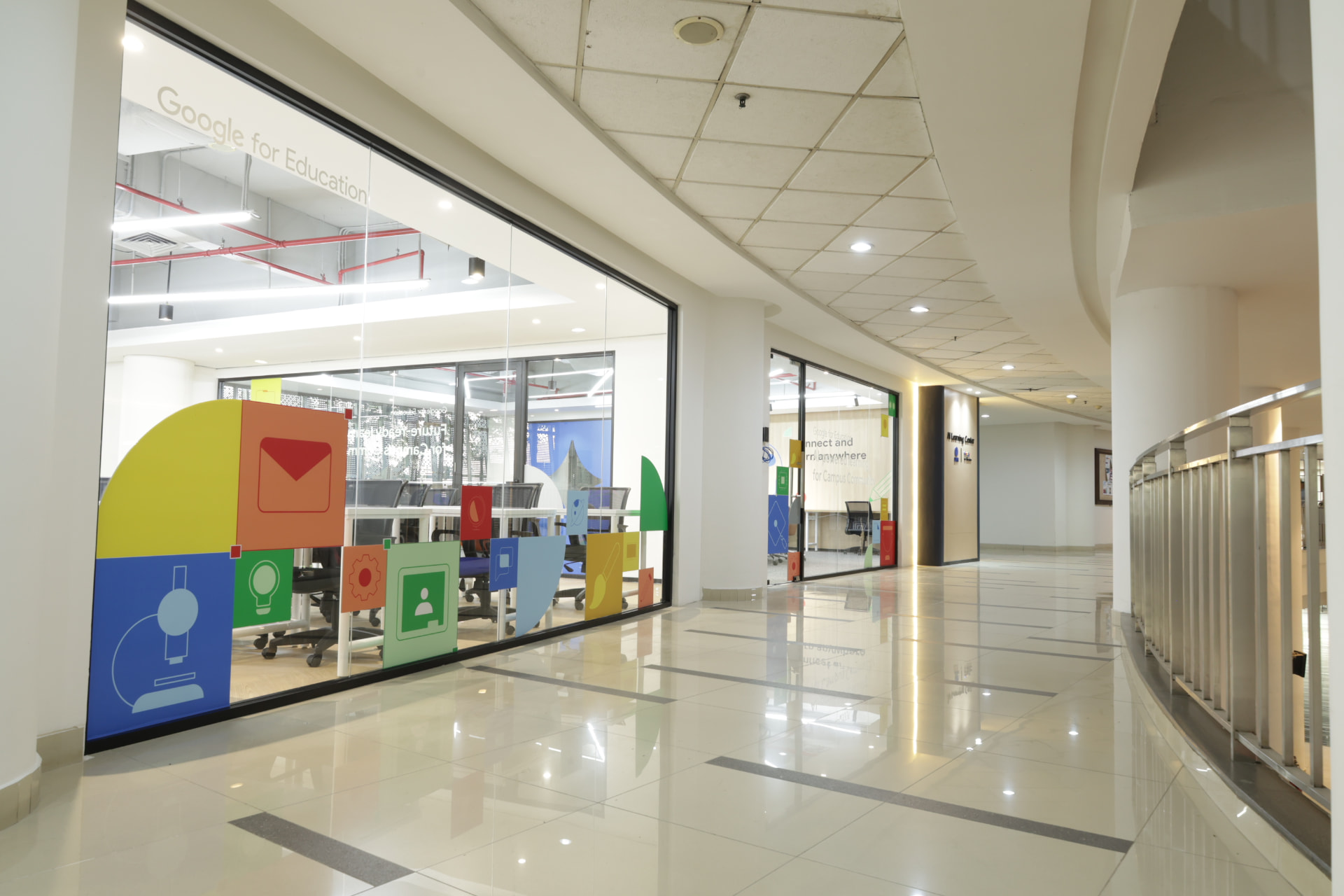 Corridor and Google for Education glass facade of the AI Learning Center
